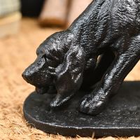 Detailed image of dog face on cast iron boot scraper Detailed image of dog face on cast iron boot scraper