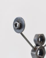 Close up of hat detail on scrap metal sculpture