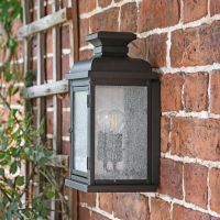 View fo the side of the "York" Aged Copper Wall Lantern Mounted on a Brick Wall