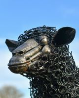 Sheep"s face, made from recycled materials  Sheep"s face, made from recycled materials