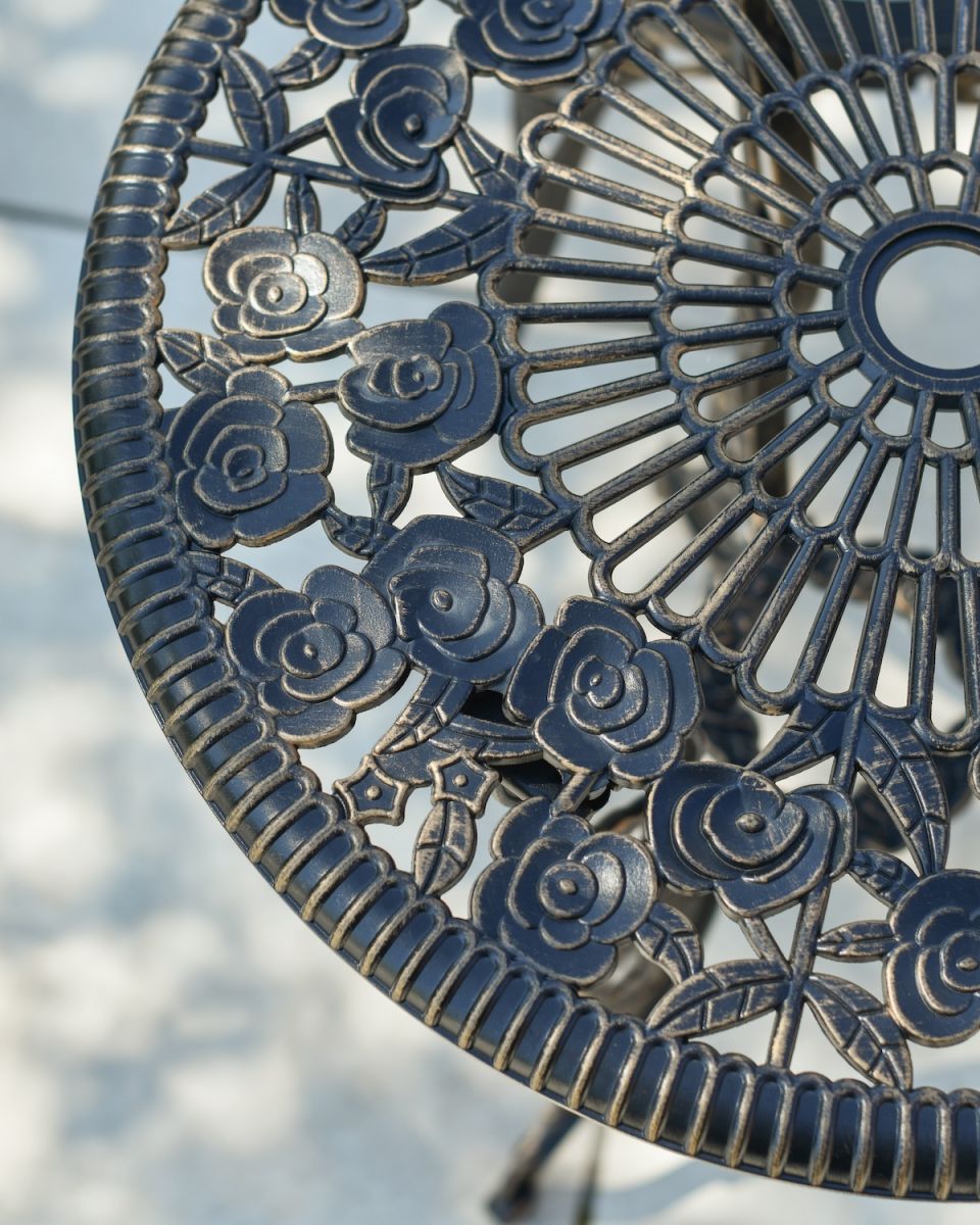 Close up of intricate pattern on cast aluminium table top