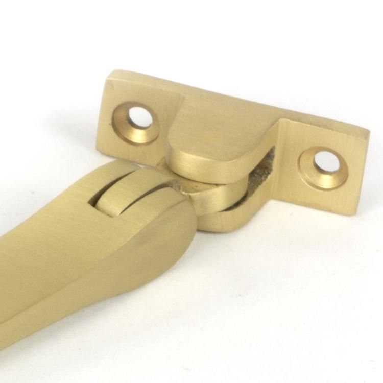Close-Up of 10" Satin Brass Four Pin Window Stay - 296mm