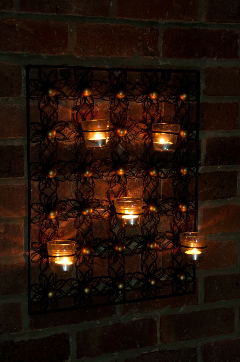 Flower wall art with candle holder
