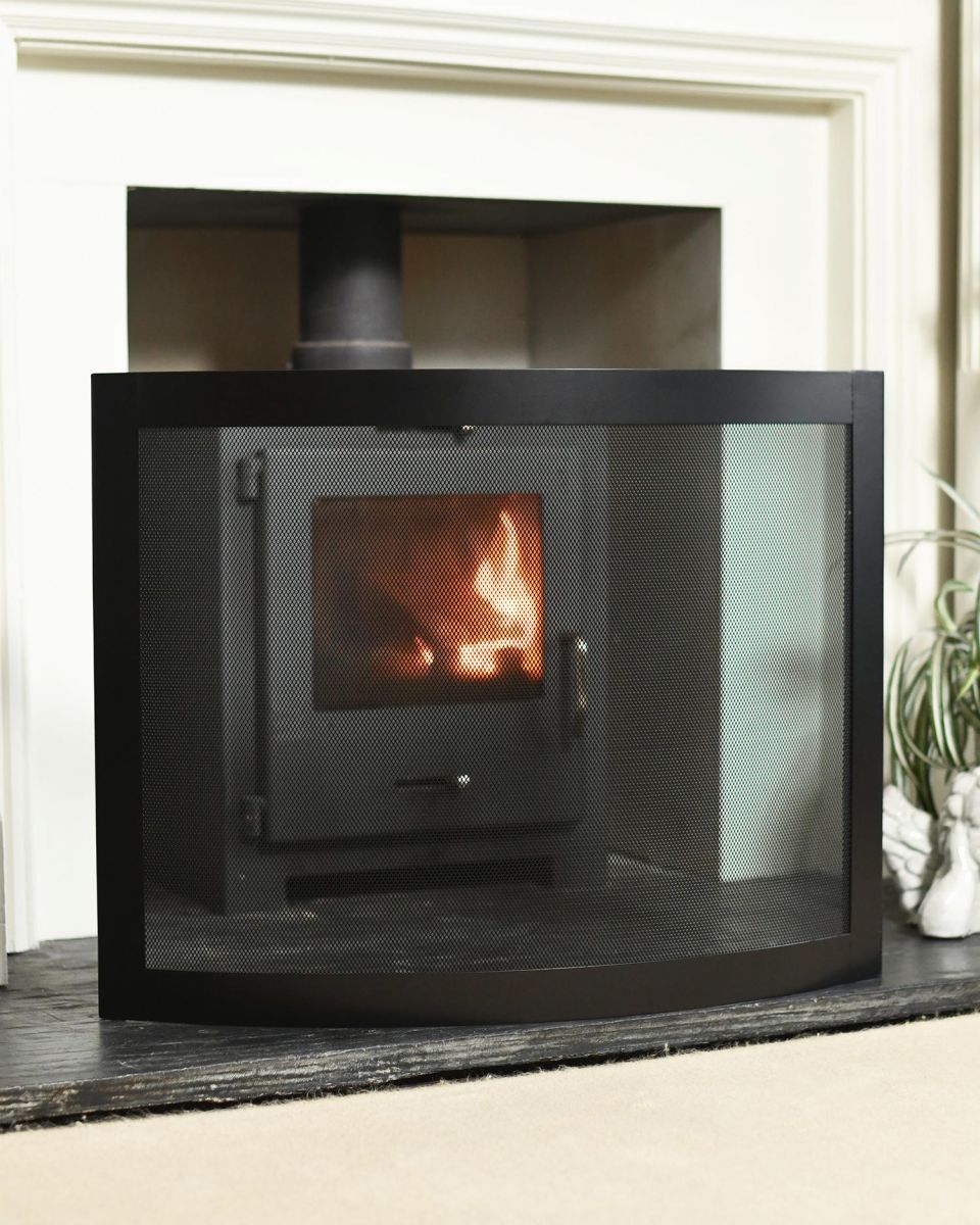 Situ Shot of "Carrowdrock" Contemporary Curved Bespoke Fire Guard 