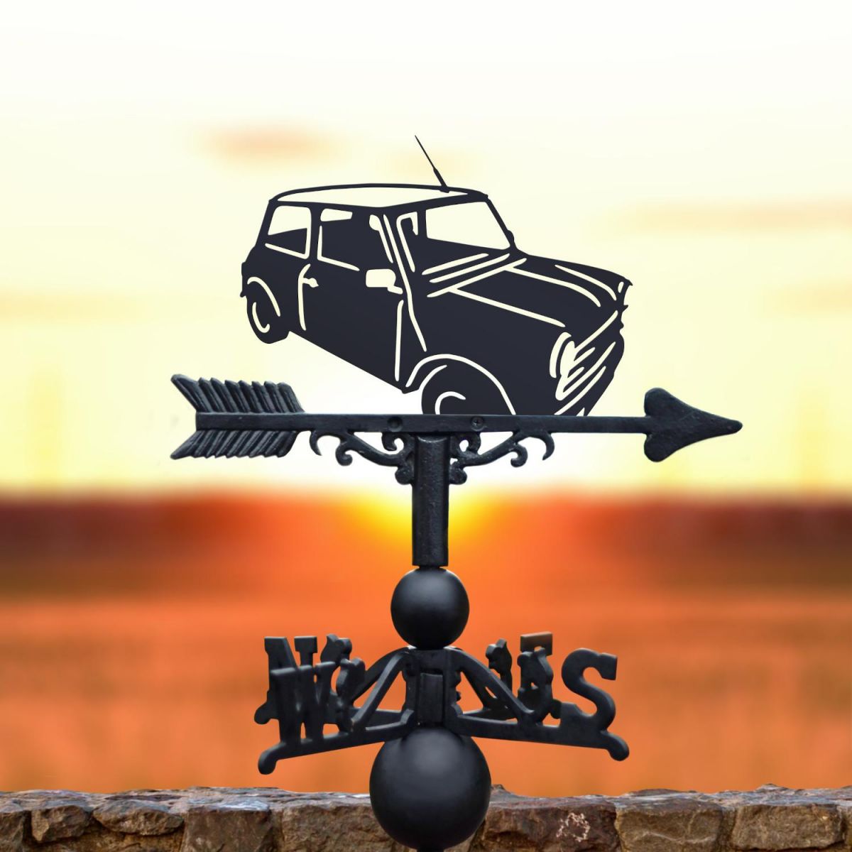 Classic mini weathervane in the sunset