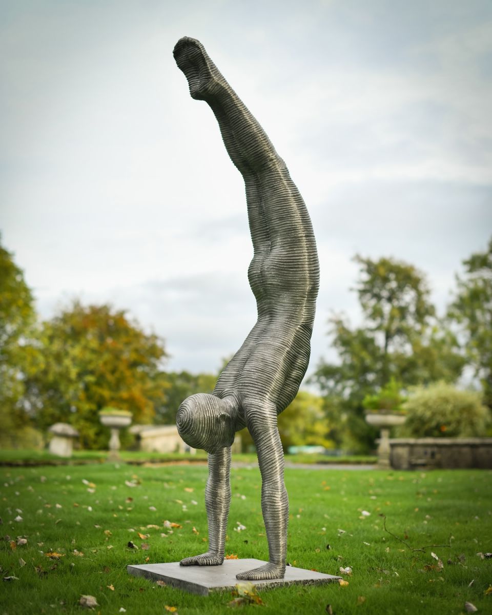 Handstand figure garden sculpture