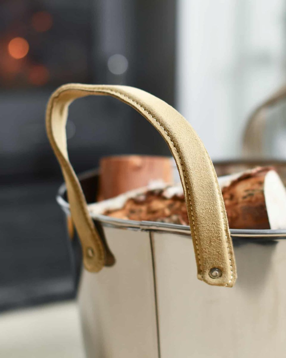 Close-Up of Handles for “Radcliffe Hall” Stainless Steel Log Basket 