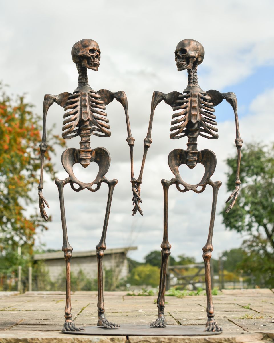 "The Happy Haunters" Pair of Skeletons