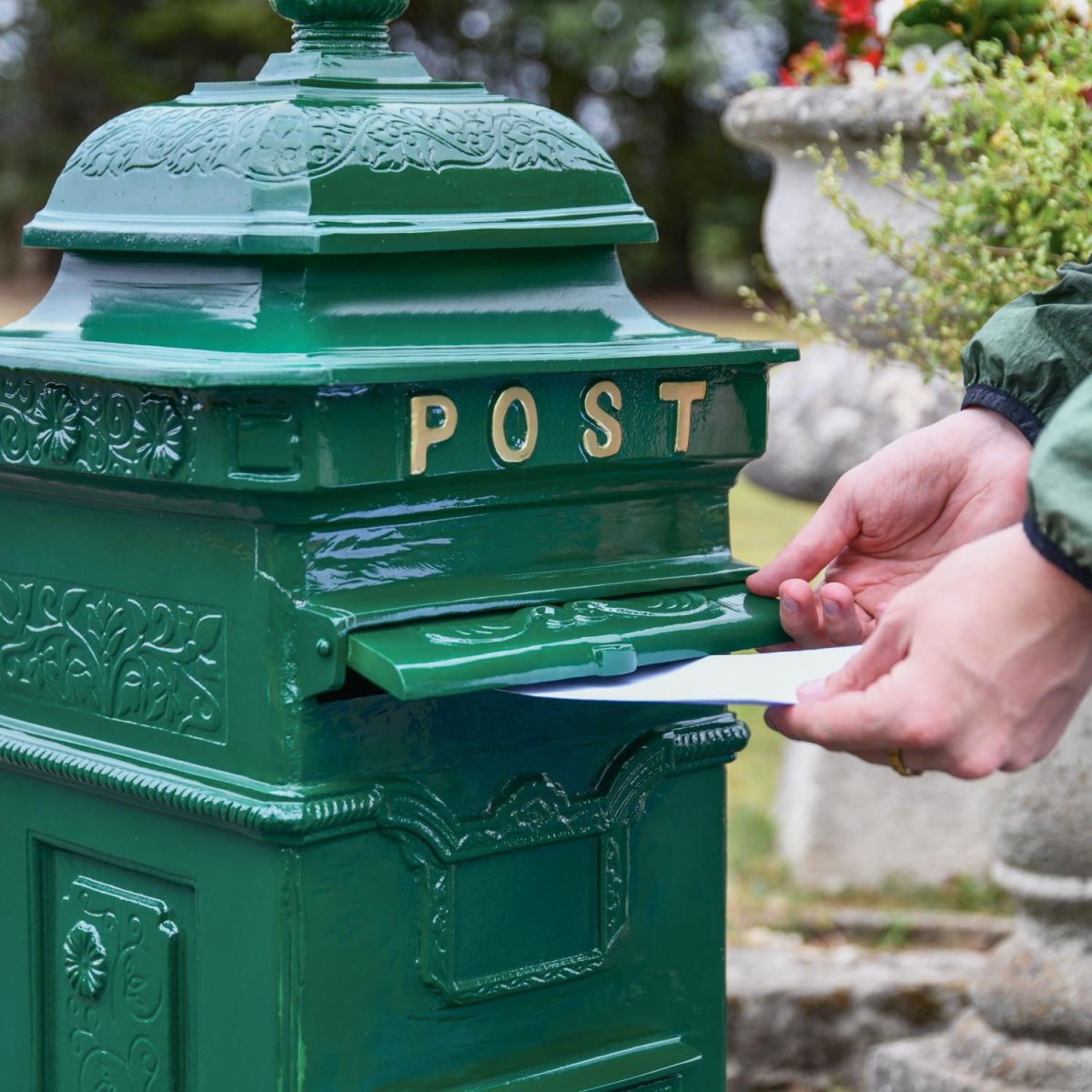 Letter Opening in Use on “Woodland Ivy” Green Camden Deluxe Free Standing Post Box