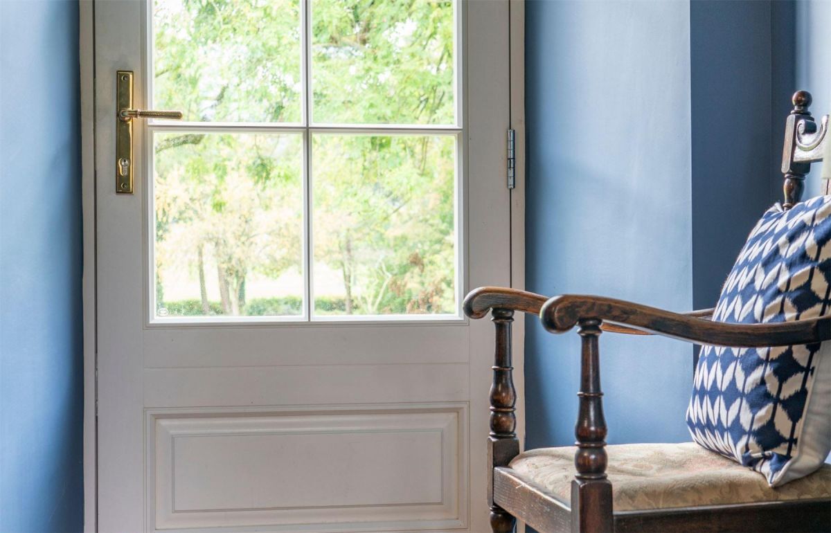 Aged Brass Slimline Espag Lever Door Handle in Situ