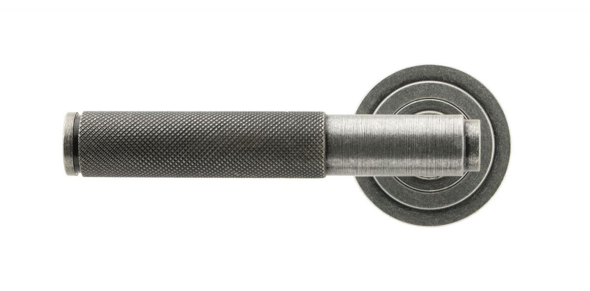 Aged Pewter Textured Unsprung Lever Door Handle on Art Deco Rose Front