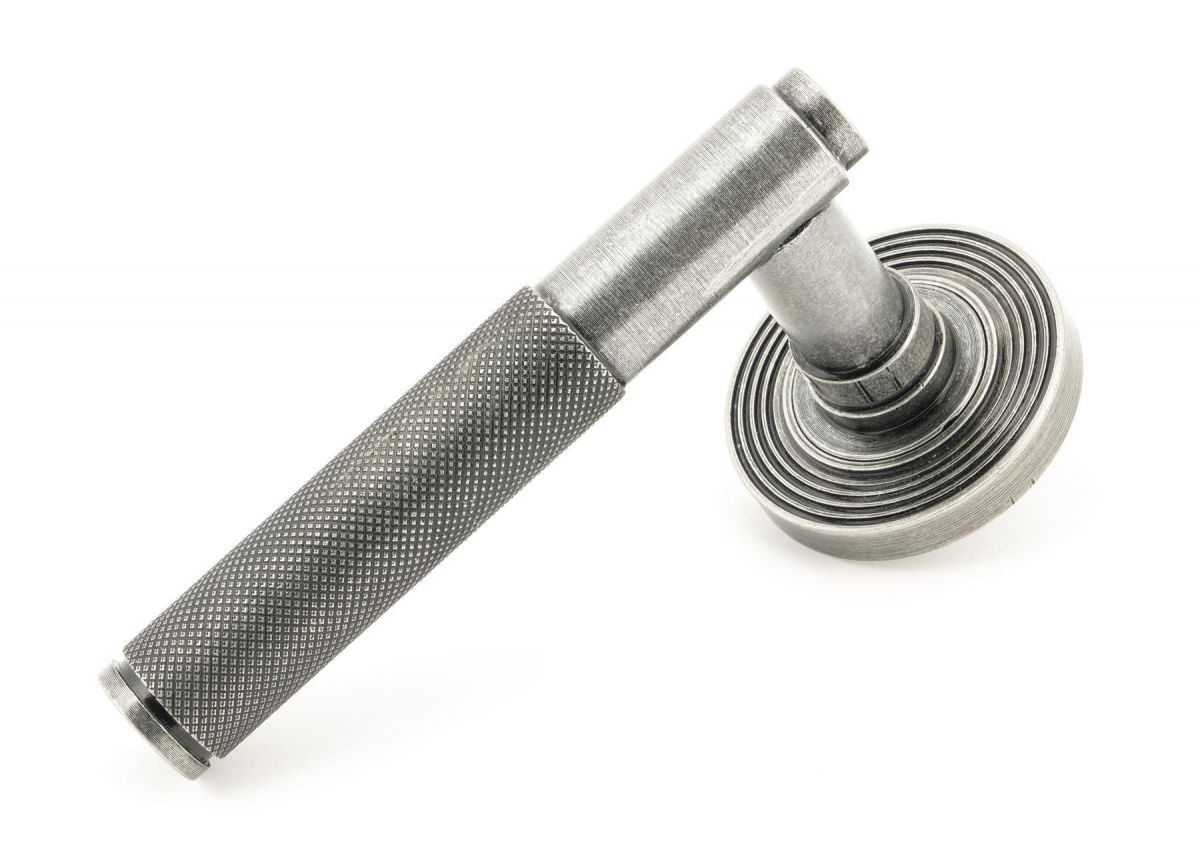 Aged Pewter Textured Unsprung Lever Door Handle on Beehive Rose