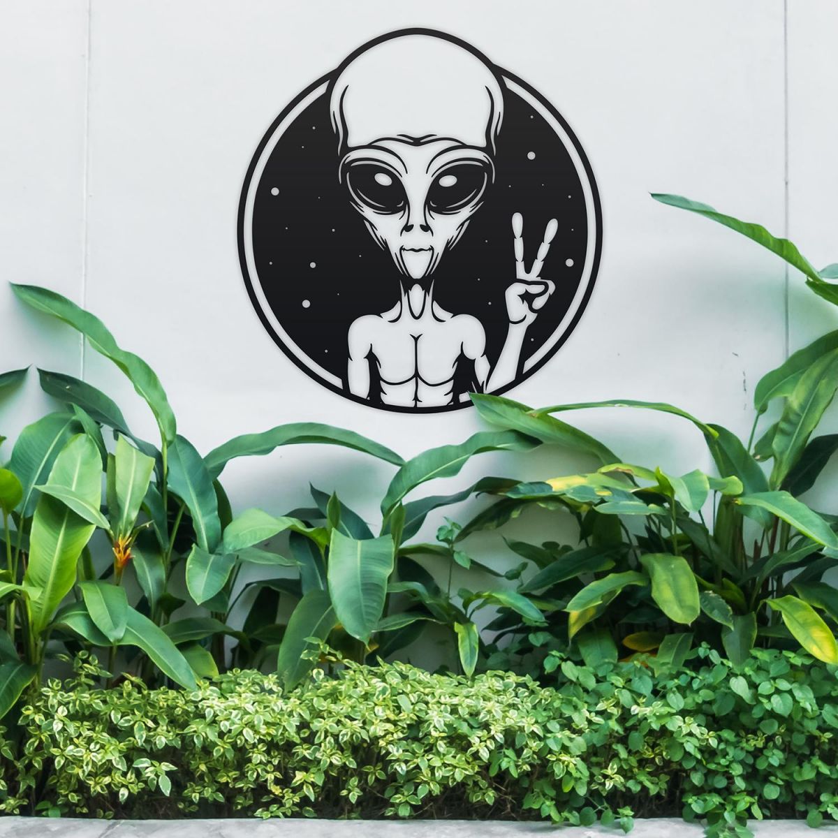 Peace Sign Alien Wall Art in Use in the Garden