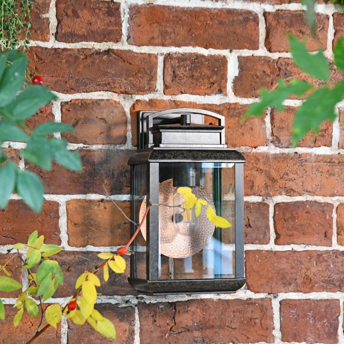 Antique Bronze Hanging Wall Light in Situ on a Garden Wall