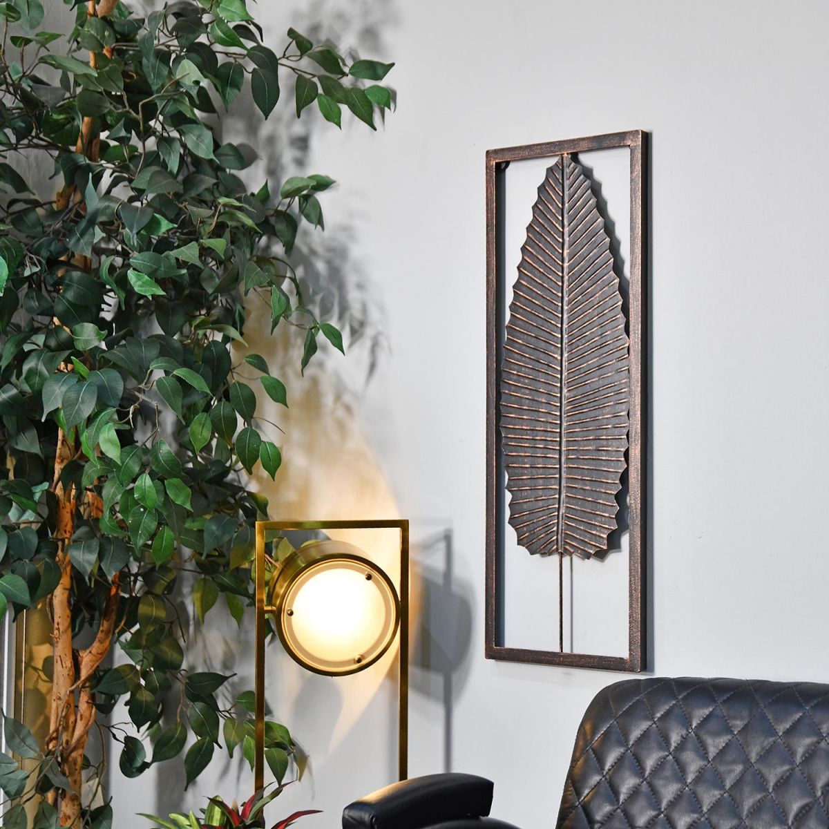 Antique Bronze Leaf Wall Art in Frame in a Modern Setting