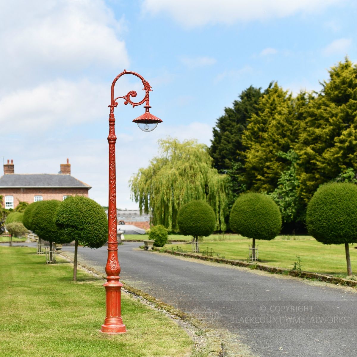 Antique Cast Iron Lamp Post On House Driveway