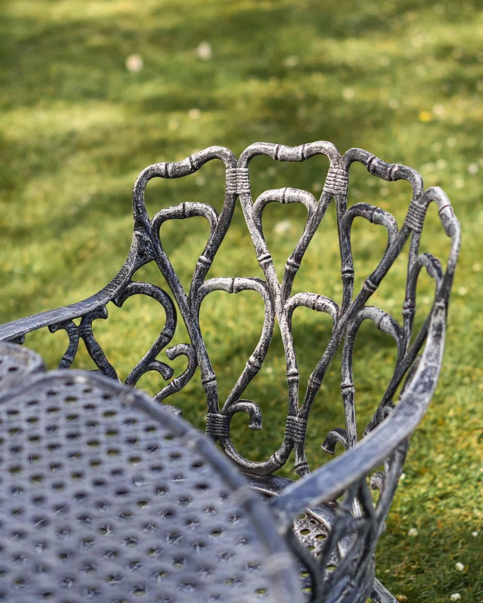 Close-Up of Ornate Backrest Design on Chair