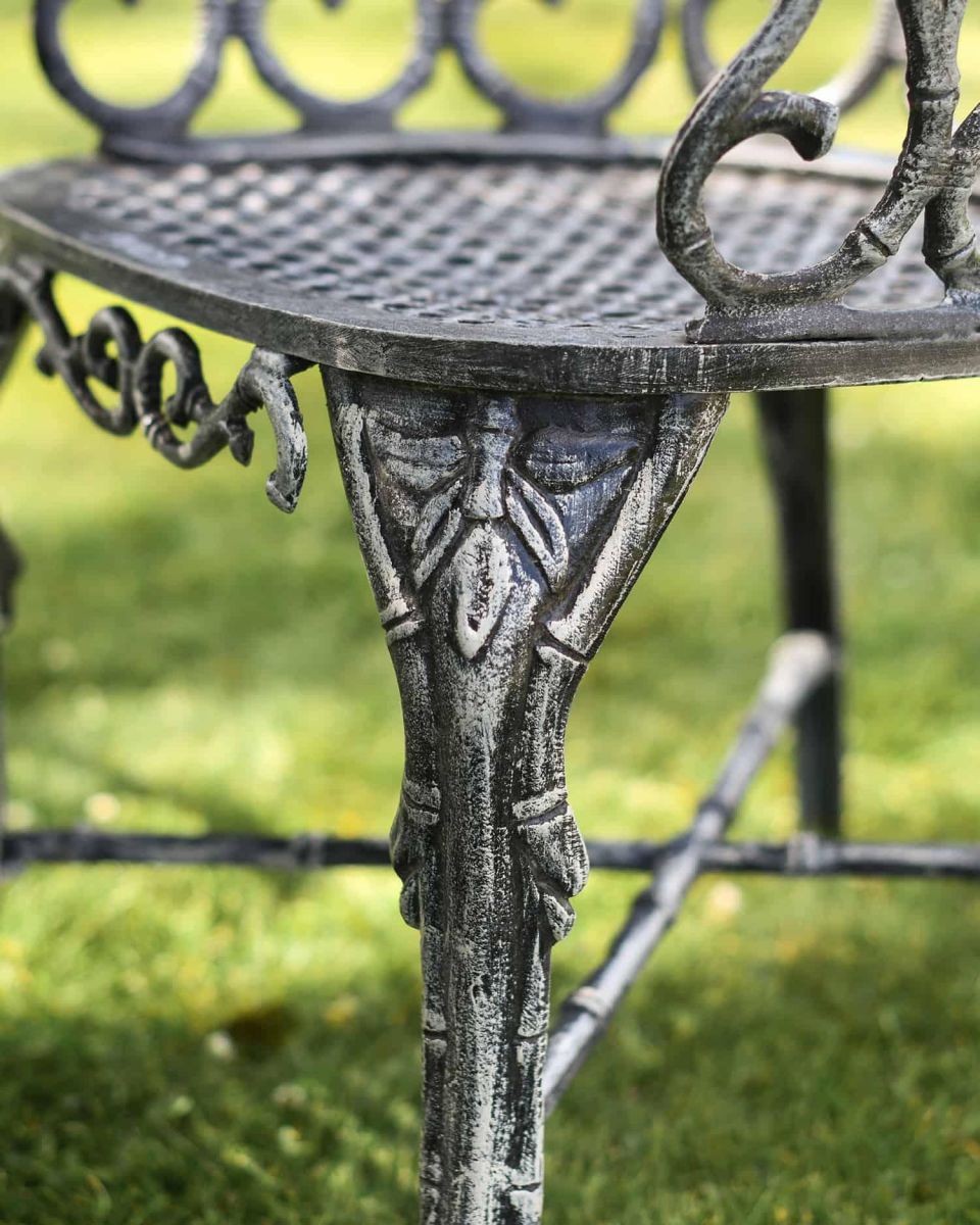Close-Up of Ornate Leg Design on Chairs