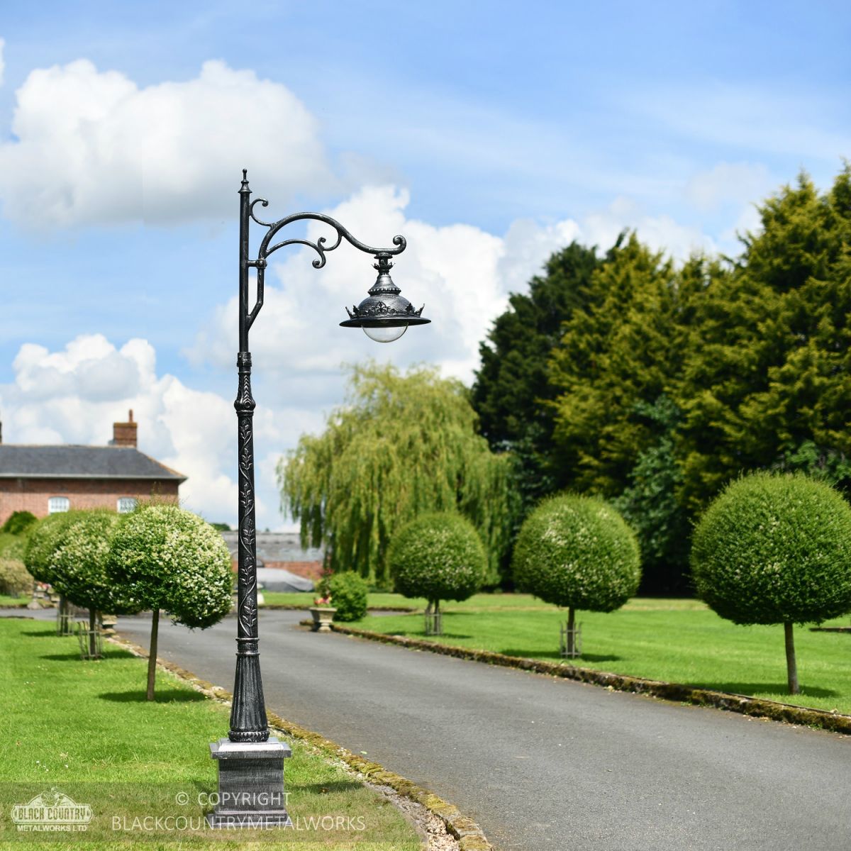 Antique Silver Ornate Lamp Post On Driveway Edge