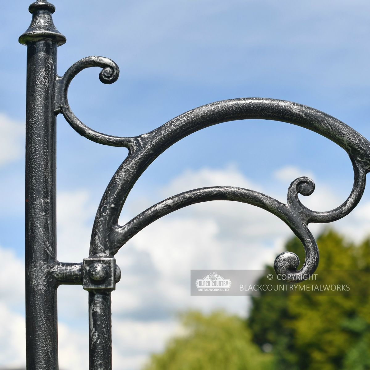 Antique Silver Ornate Scroll Bracket On Lamp Post
