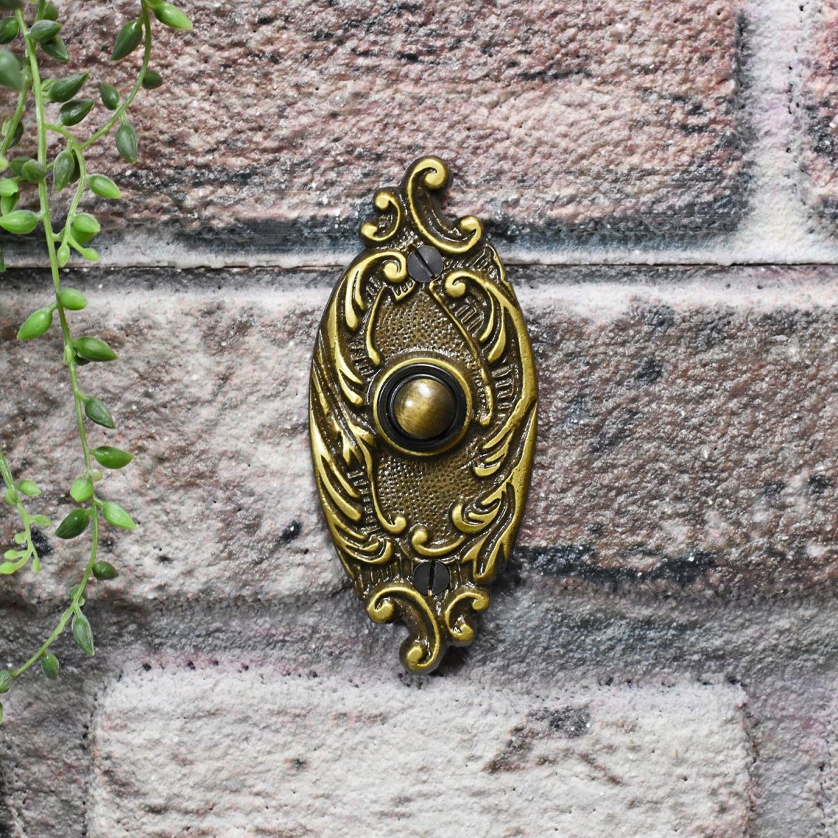 Exterior Door bell push button finished in Antique Brass