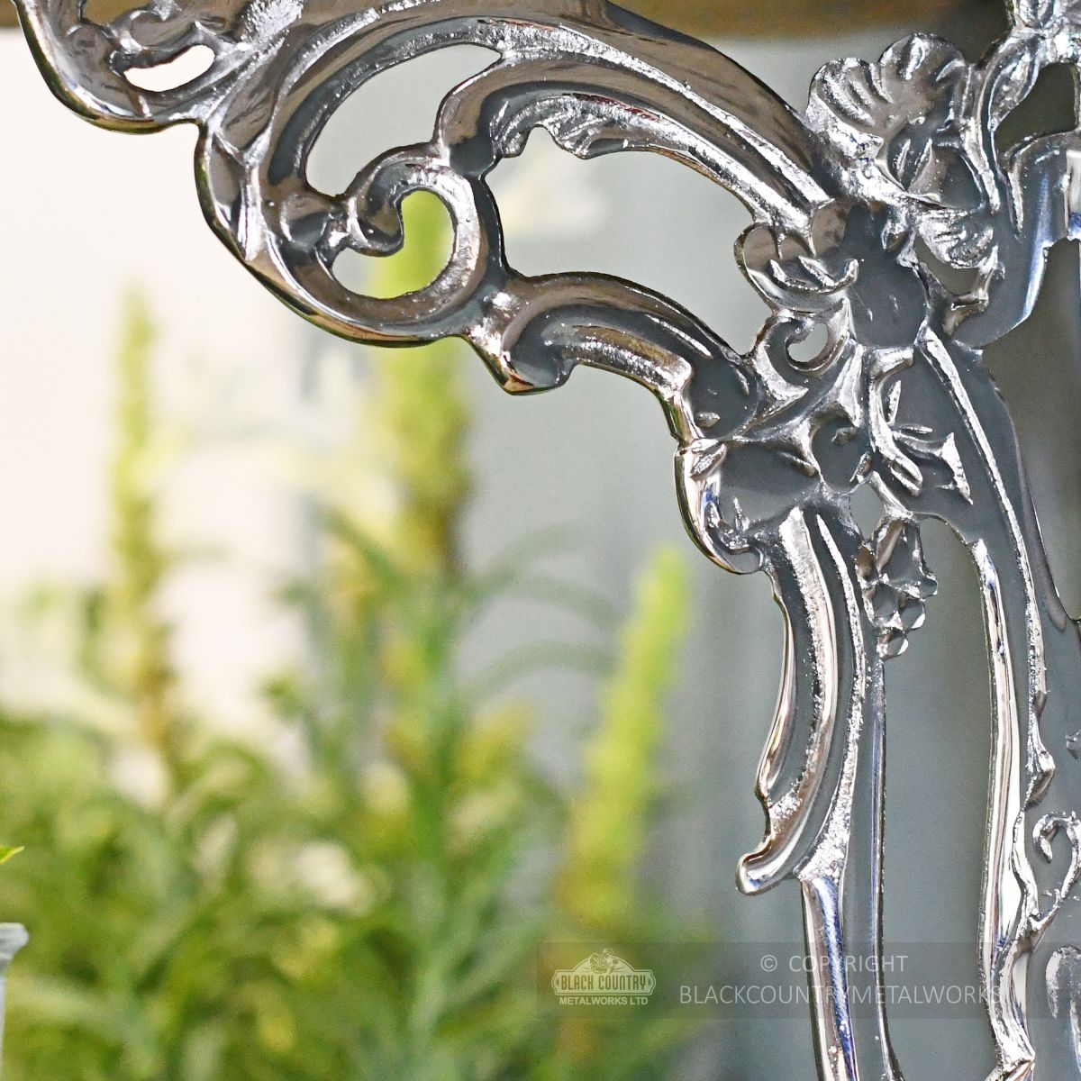 Close up of detailed casting on ornate shelf bracket