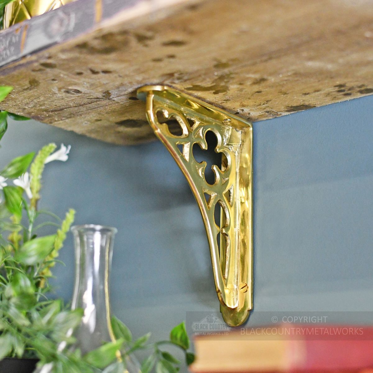 Polished brass shelf bracket
