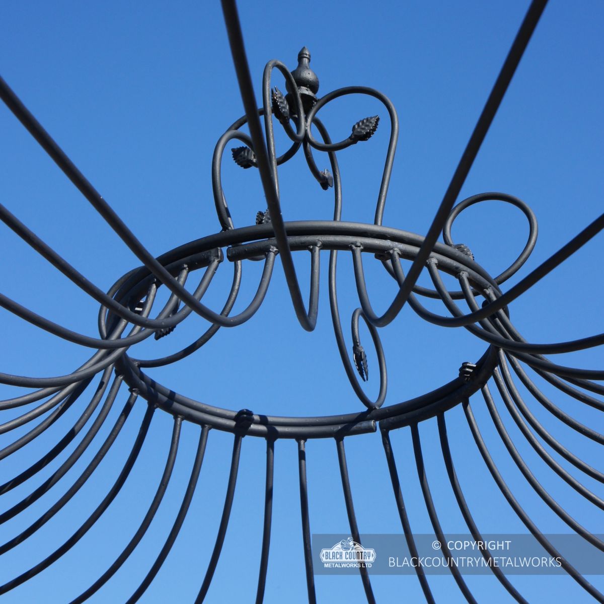 Ornate crown finial with intricate detailing