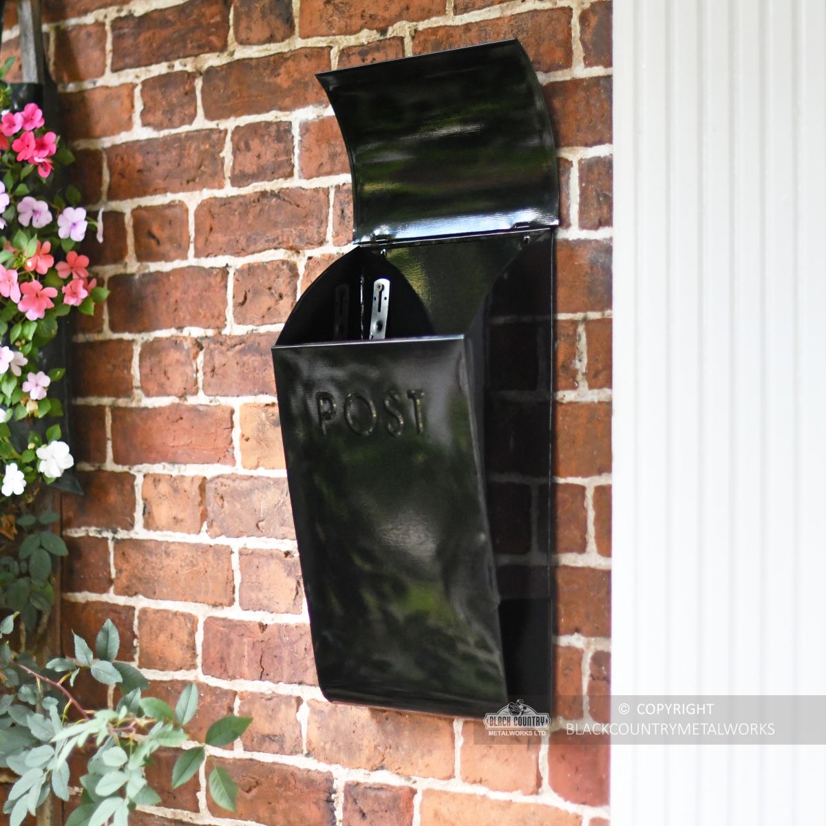 curved lid on robust steel post box