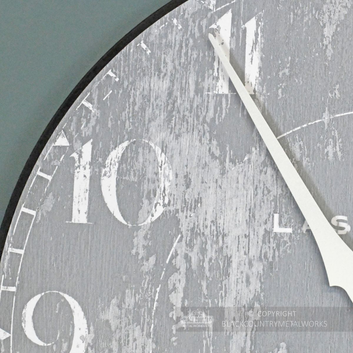 Close up of shabby chic print on wall clock