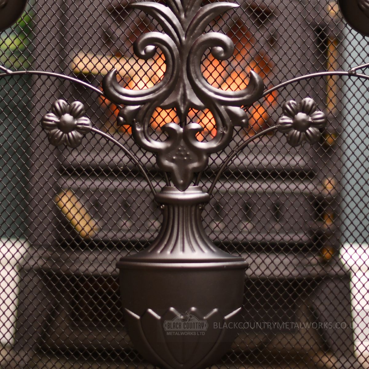 Close up image of Flower pot design on mesh screen