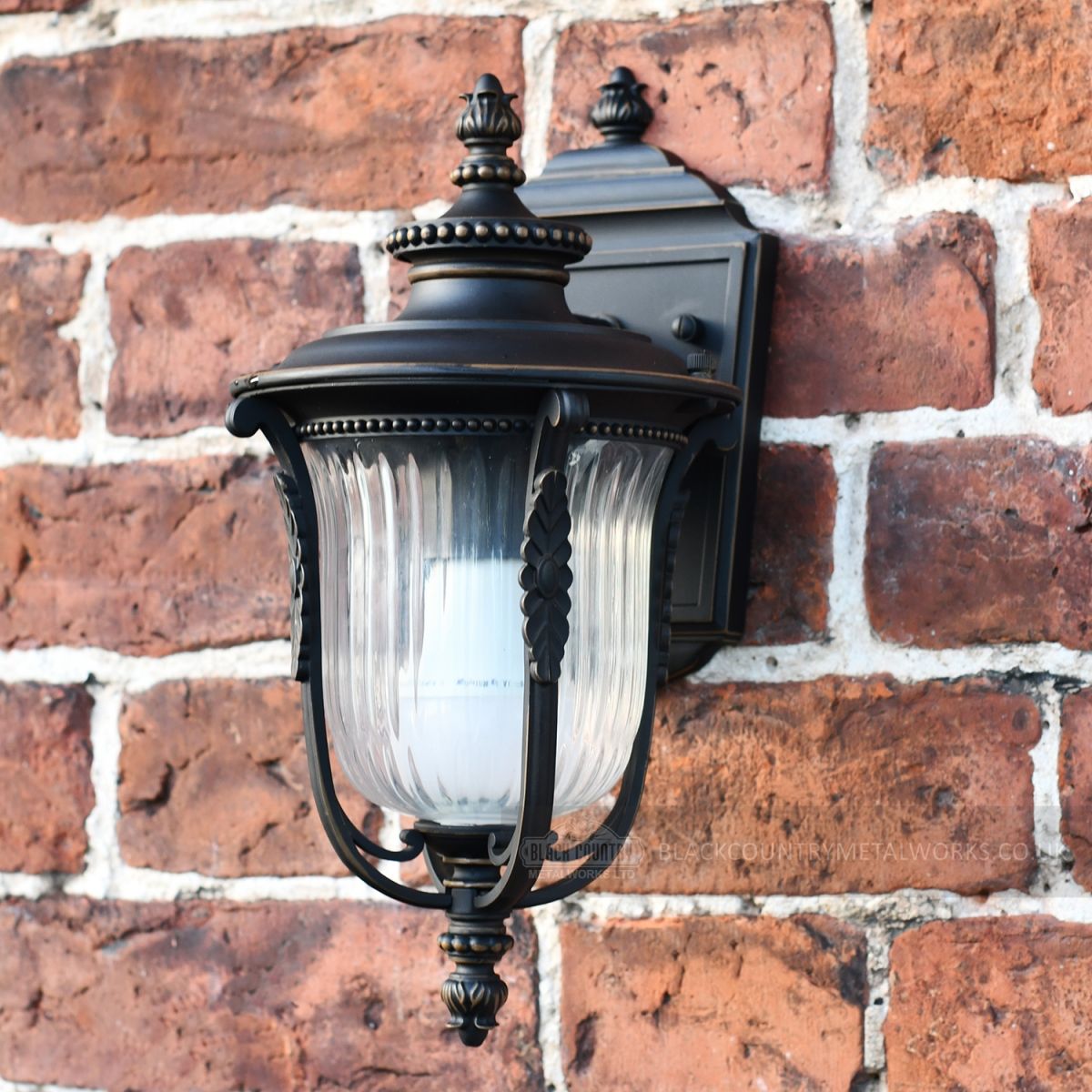 Bronze Christleton Wall Lantern on brick wall