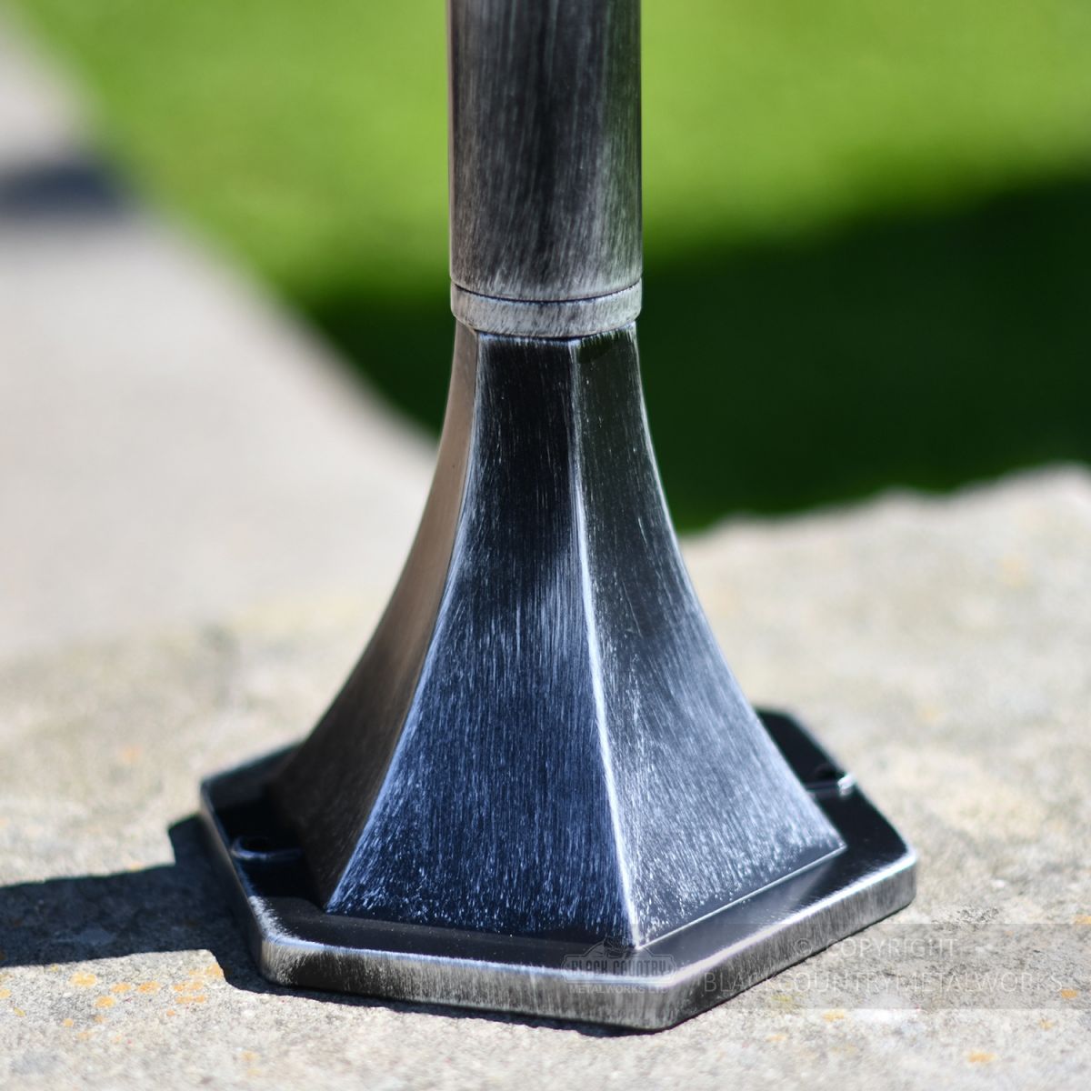 Close up of fixing points on base of driveway lantern