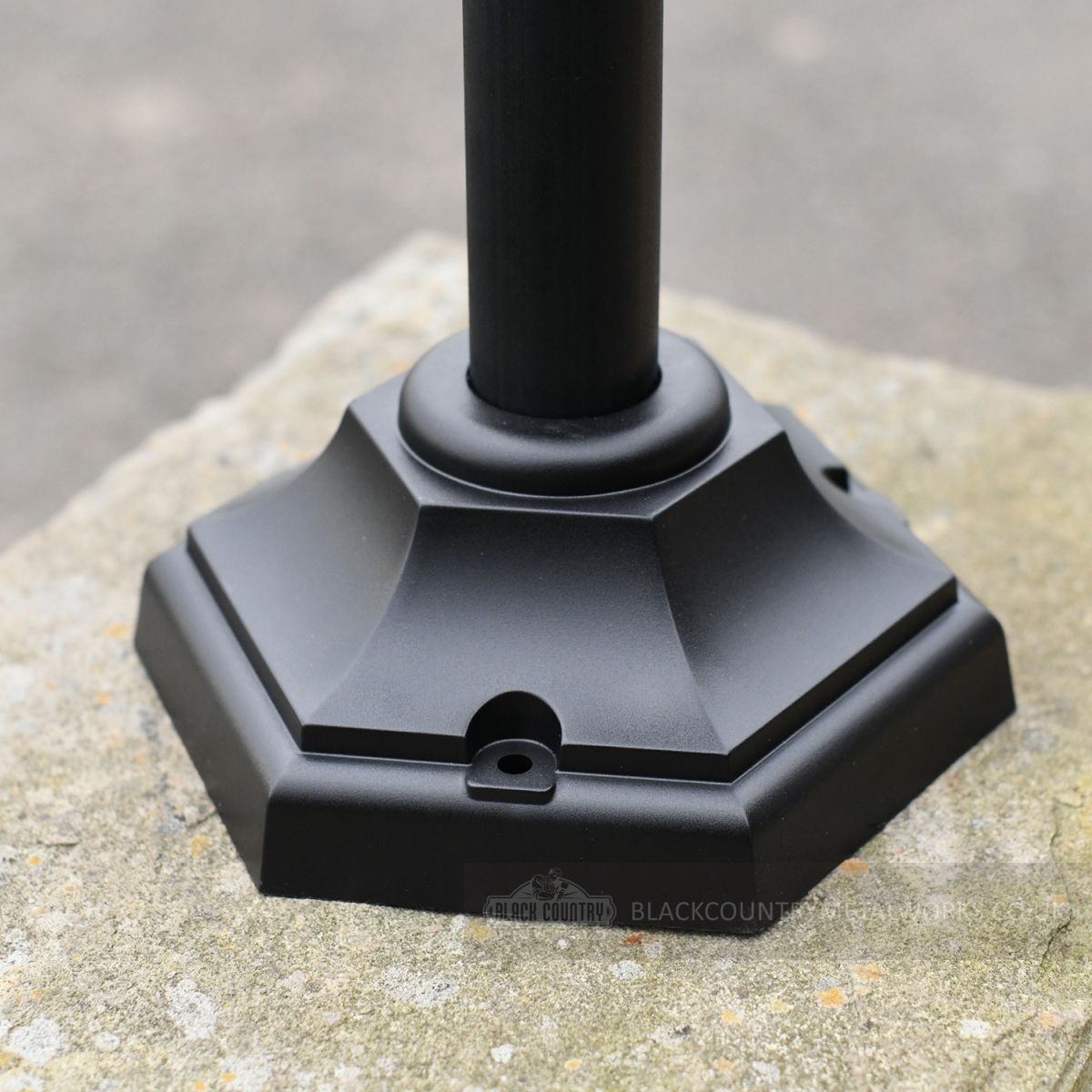 Base with fixing points for pillar lamp post