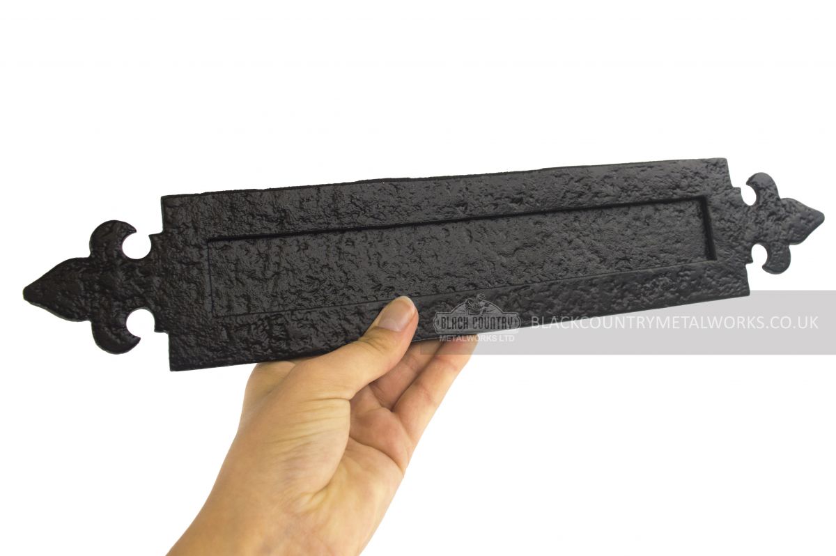 Hand Holding letter plate