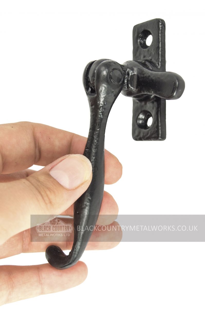 Hand using Contemporary Iron Casement Stay