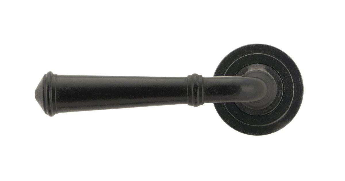 Black Beeswax Lever Door Handle on Art Deco Rose Front
