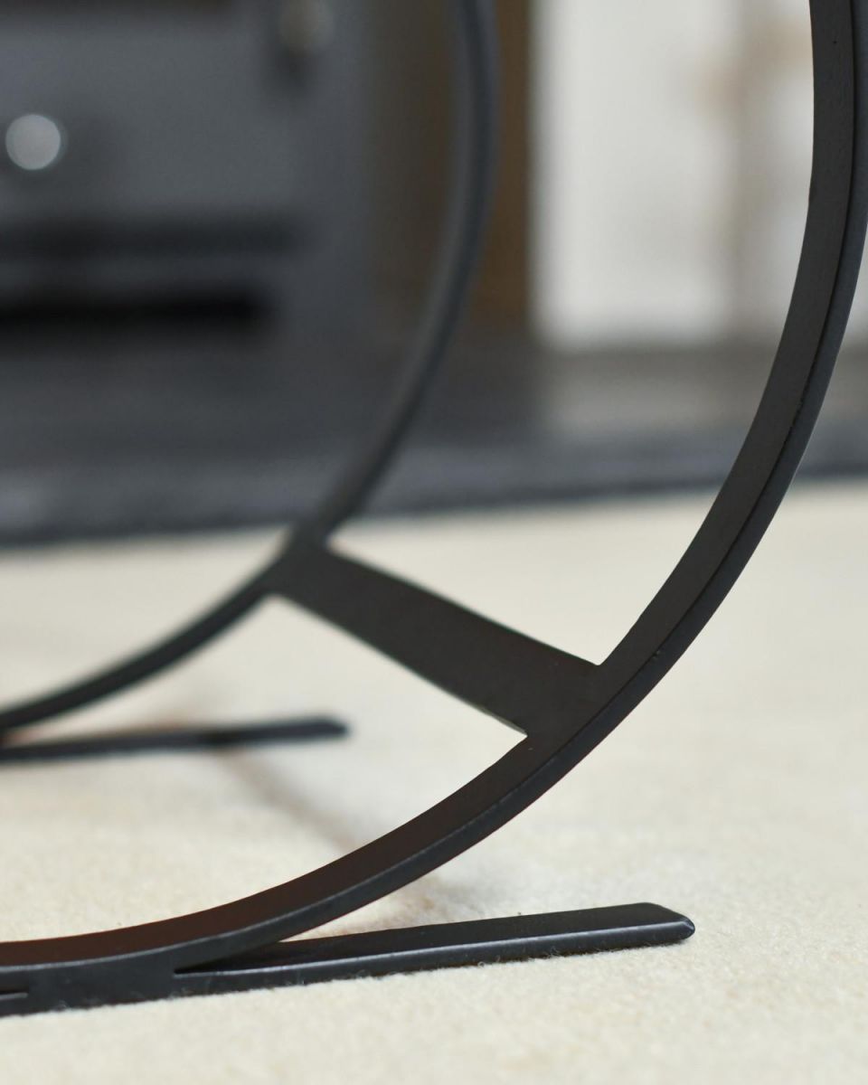 Close Up Of Black Blacksmith Curved Log Rack Structure