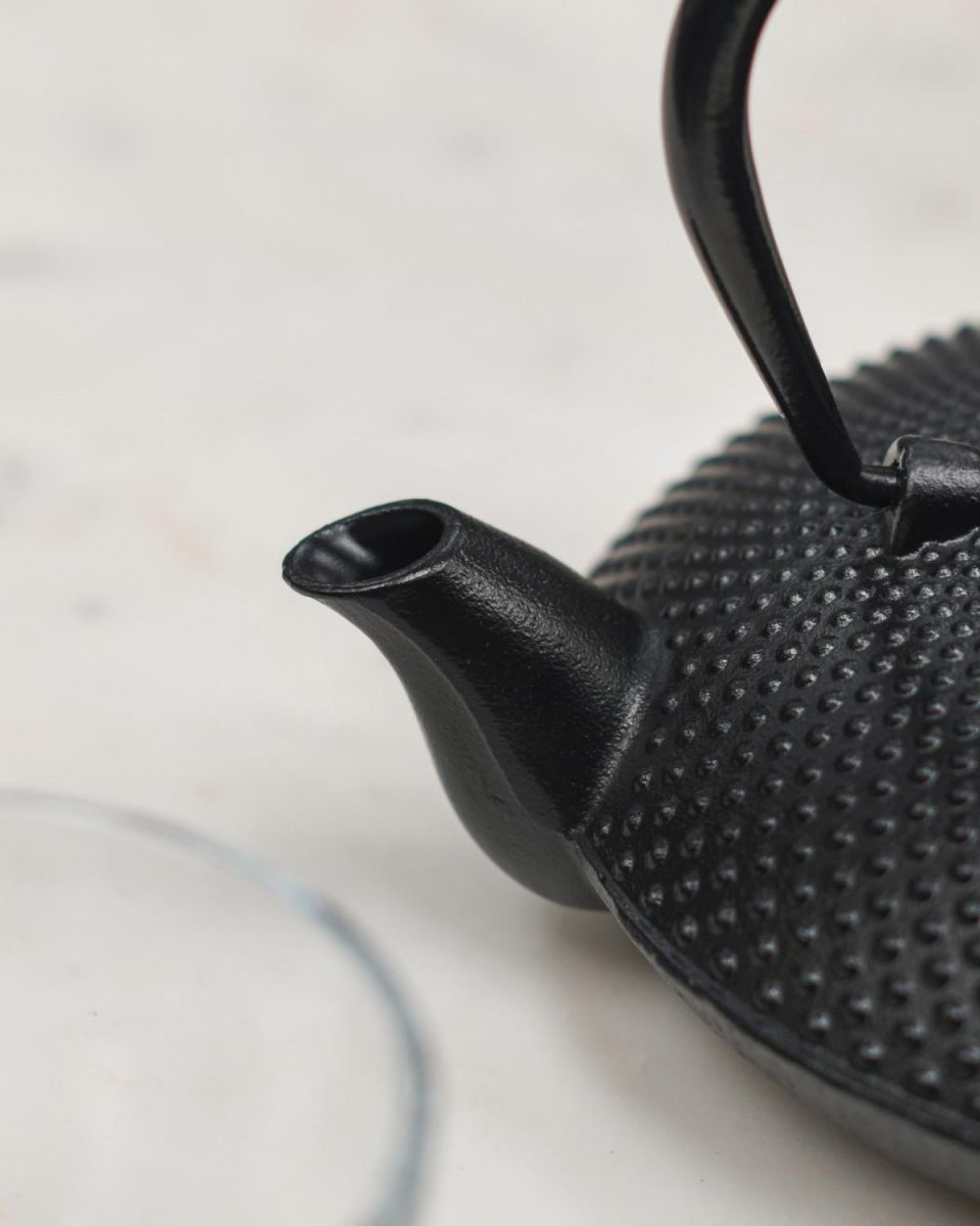 thumbnail interactive-video image 1 of 4-Pack Black Japanese Cast Iron Tea Coasters / Saucers – Floral Leaf Design 1 of 3