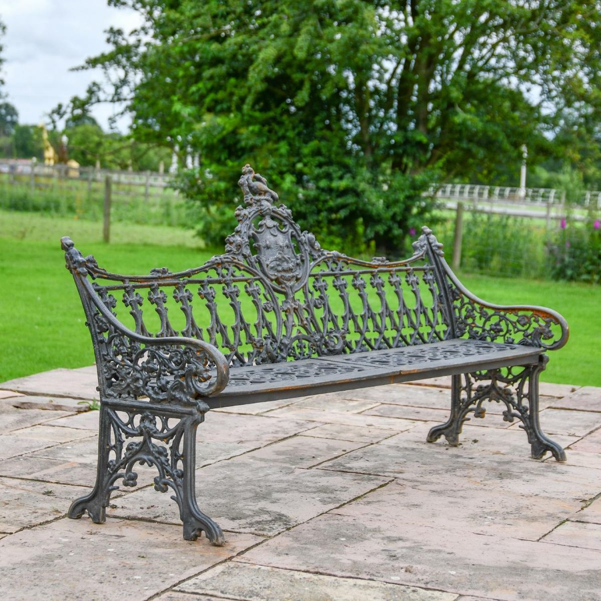 Cast Iron Aged Black Gothic Garden Bench in Situ