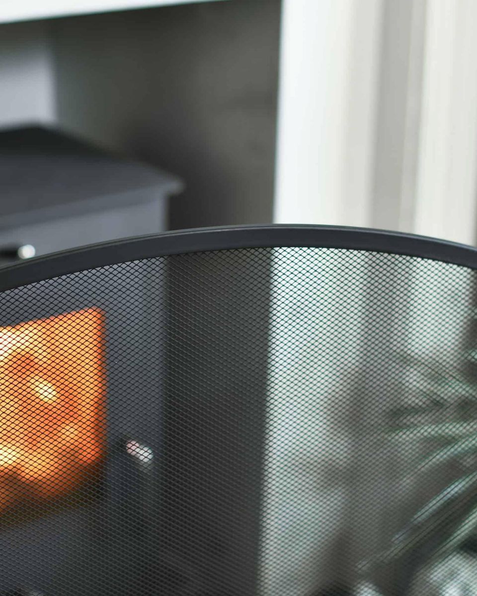 Close-Up of Black Central Arched Three Fold Fire Guard with Mesh