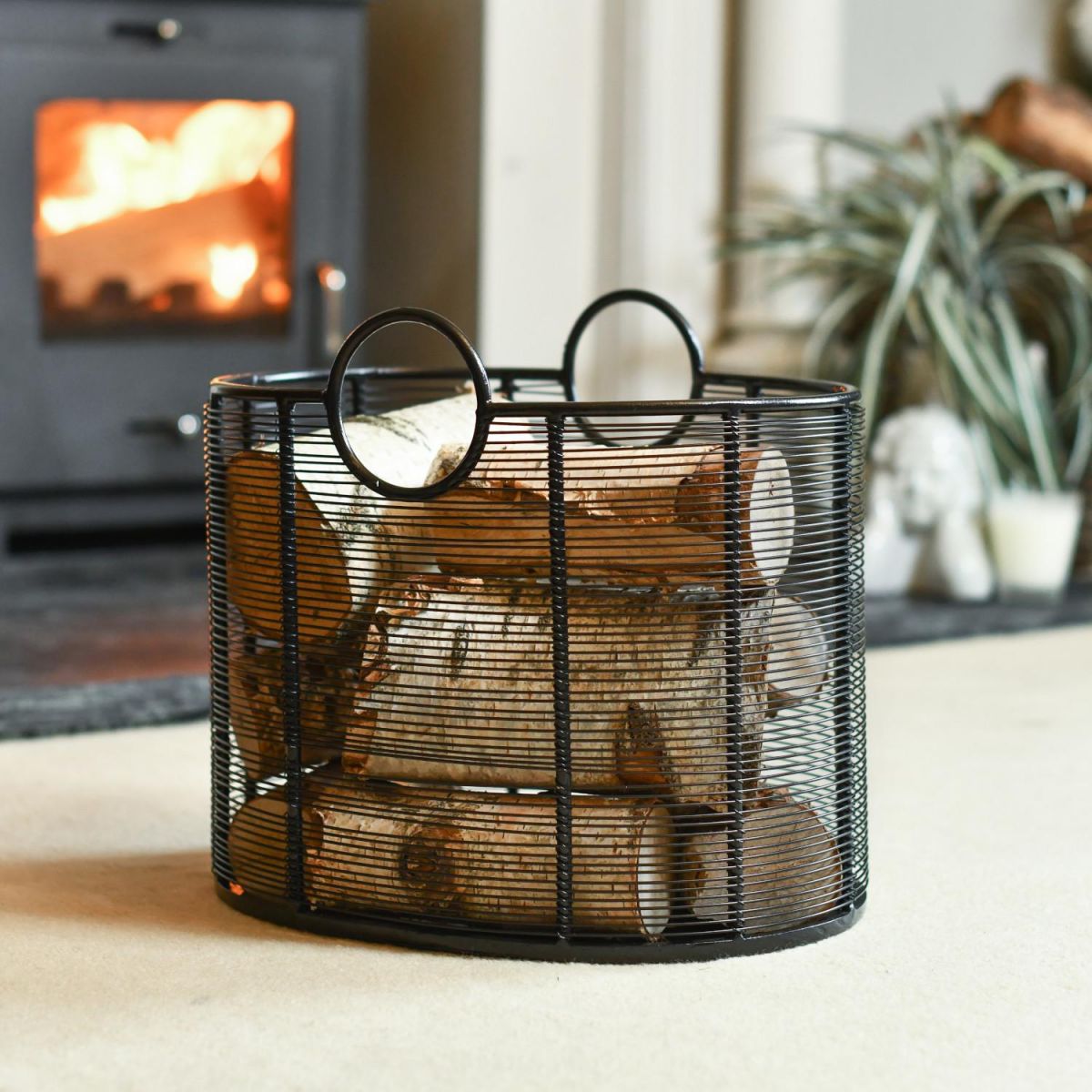Black Contemporary "Oval" Design Log Holder In Situ