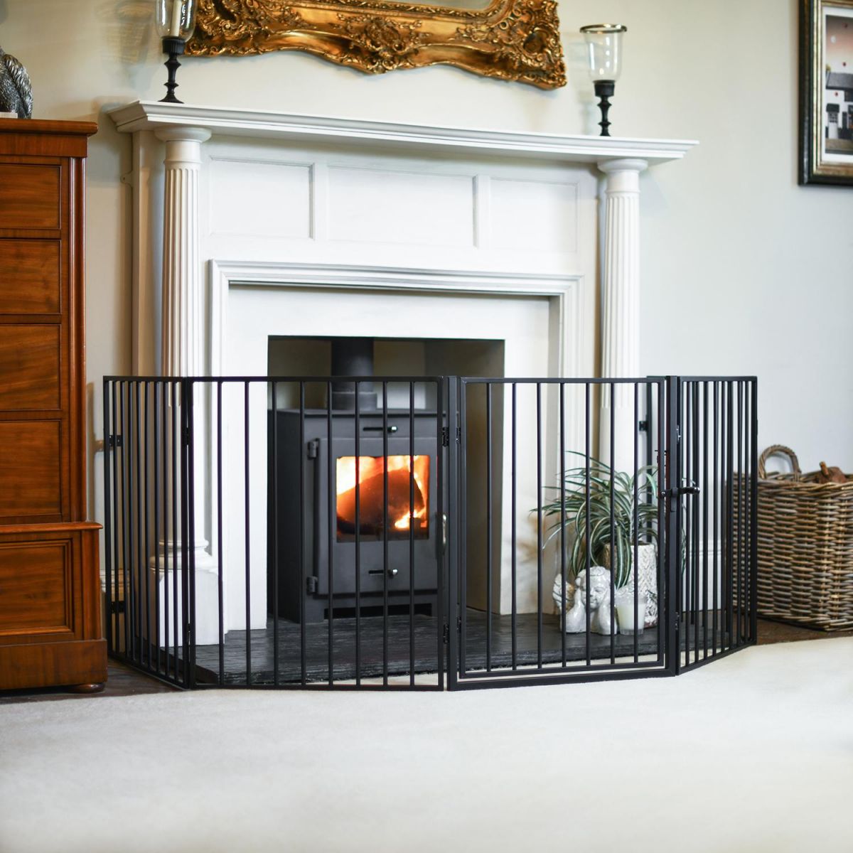 Black Traditional Five Panel Nursery Guard in Front of the Fire Place