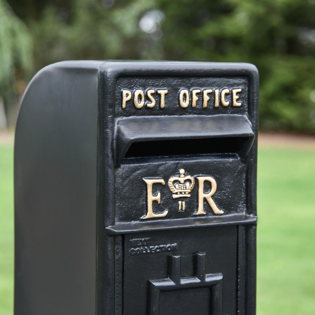 Close-Up of Black & Gold Freestanding Elizabeth Regina Post Box