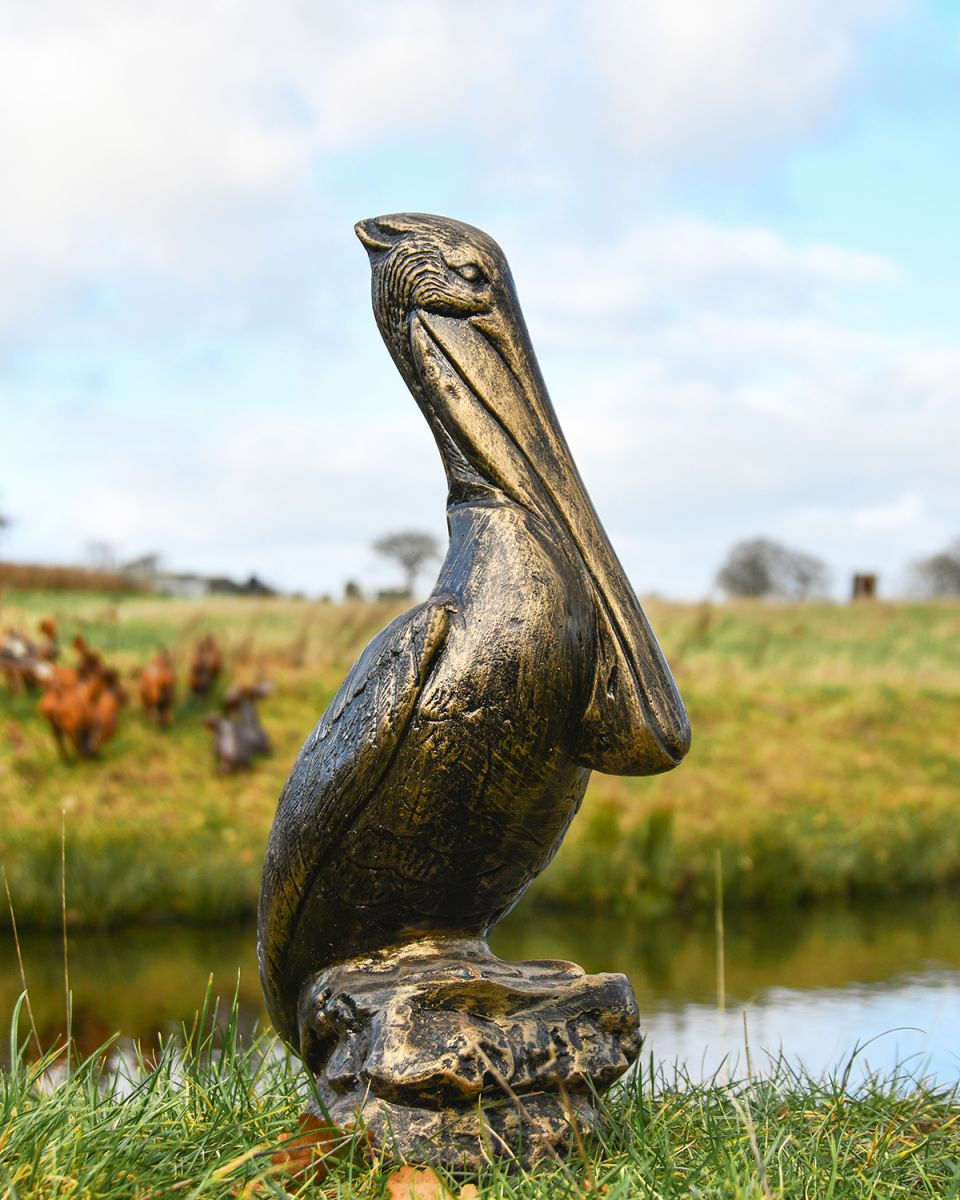 Brushed Gold Pelican Garden Sculpture in Situ