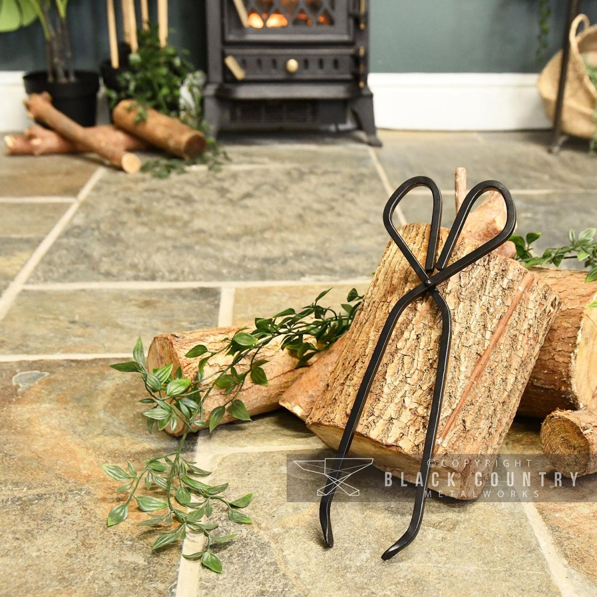 Iron Coal Tongs in Situ Next to the Fireplace