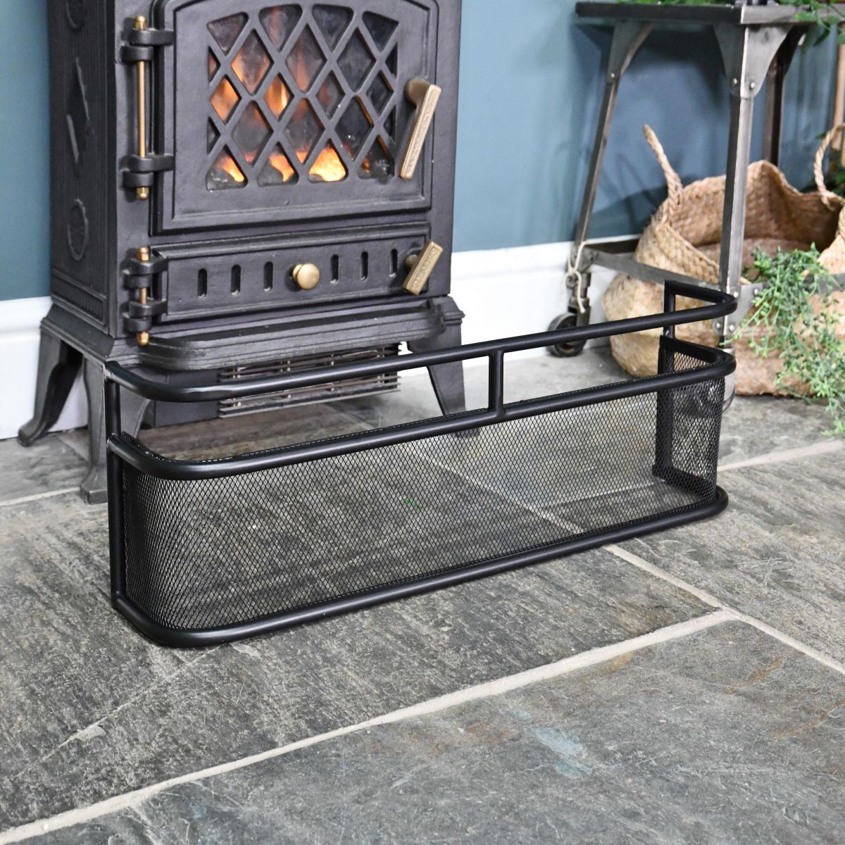 Black Low Fireside Fender Guard in Situ by the Fire