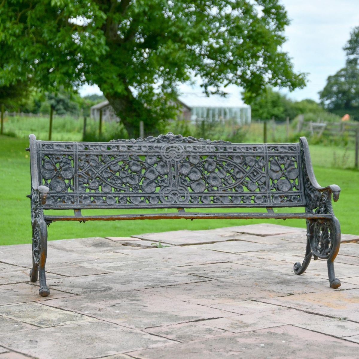 Front view of Cast Iron Aged Black Leaf Bench