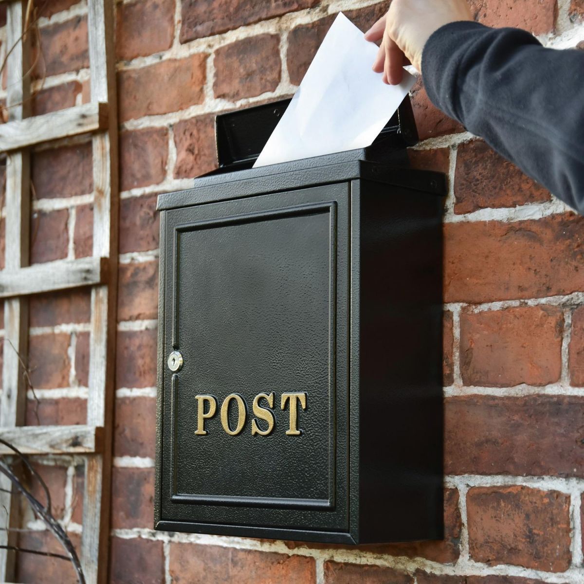 Top Opening Letter Flap on the Black "Oxford" Wall Mounted Post Box with Gold Detail