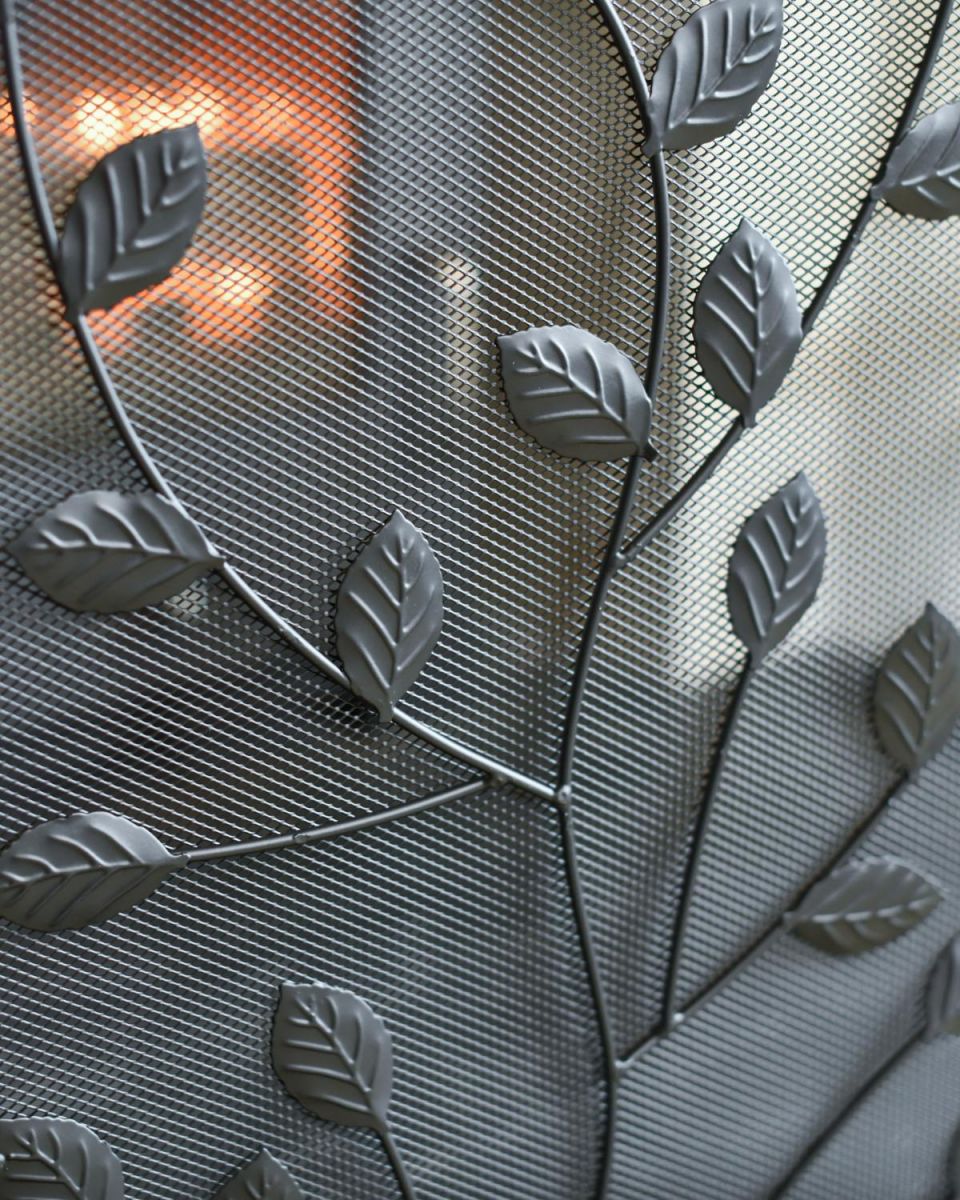 Close Up Of Black Rectangular Three Fold Fire Guard with Leaf Pattern Leaf Detailing